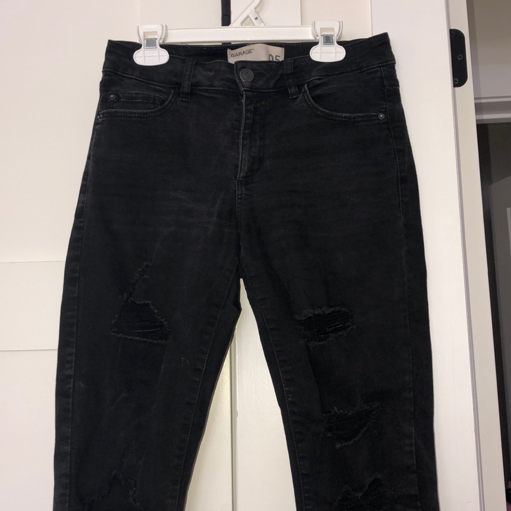 Vintage ripped black skinny jeans from Garage.